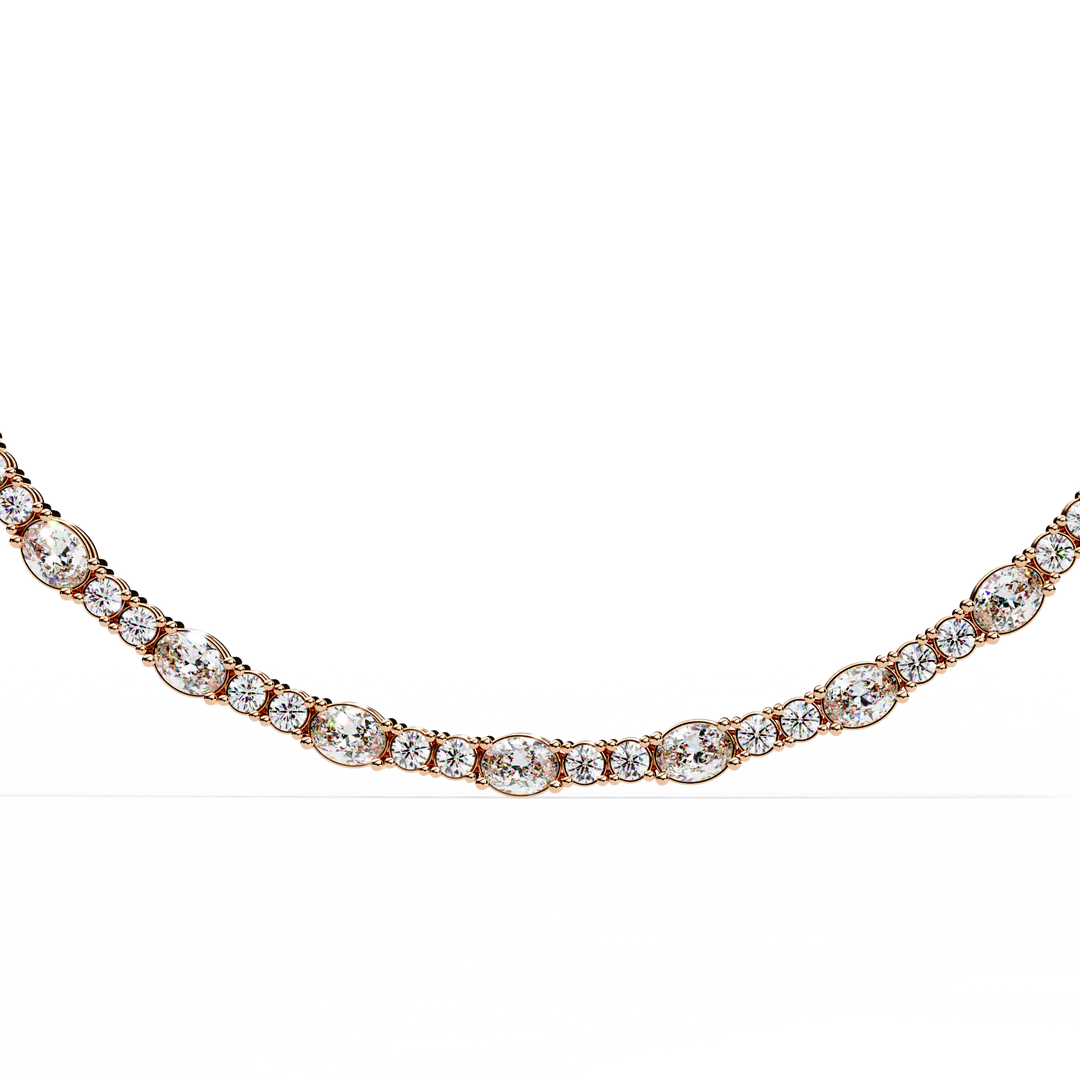 Discover our luxurious 18K Gold Lab-Grown Diamond Tennis Necklace featuring 10.61 carats of Oval and Brilliant Round Cut diamonds. Ethically crafted with exceptional brilliance for timeless elegance.