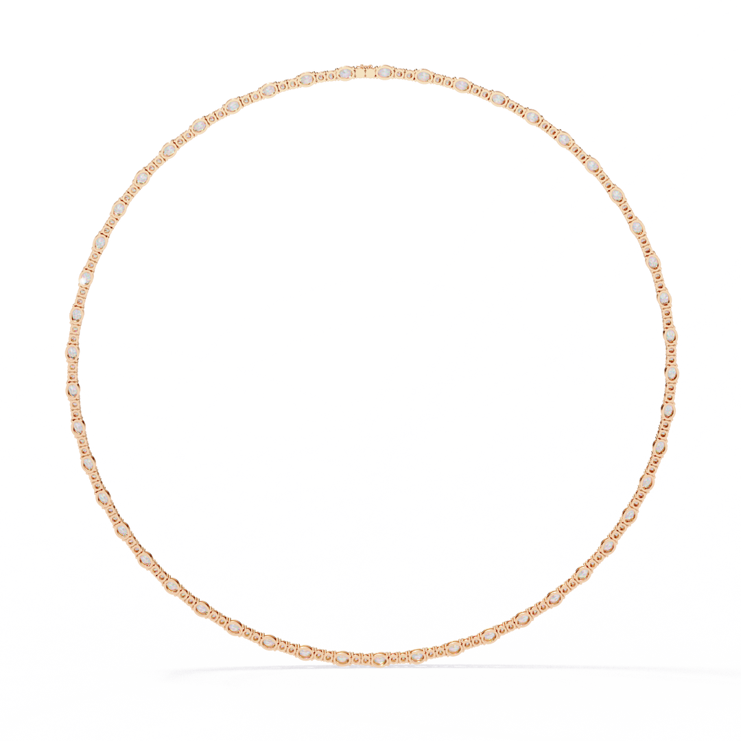Discover our luxurious 18K Gold Lab-Grown Diamond Tennis Necklace featuring 10.61 carats of Oval and Brilliant Round Cut diamonds. Ethically crafted with exceptional brilliance for timeless elegance.