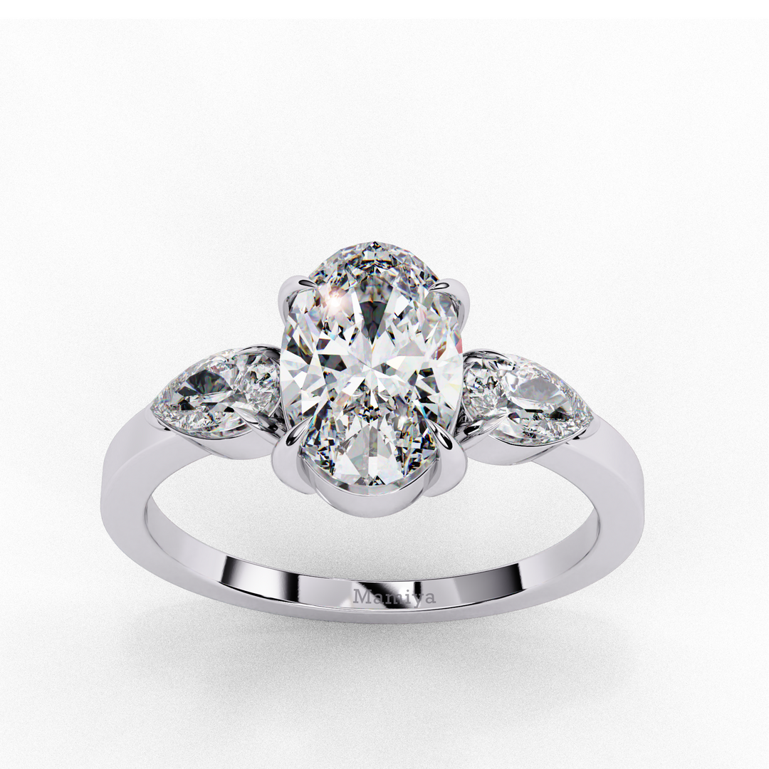 Oval With Pear Three Stone Ring