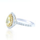 1.31Cts pear shape fancy yellow halo engagement ring