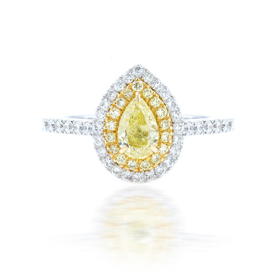 1.31Cts pear shape fancy yellow halo engagement ring