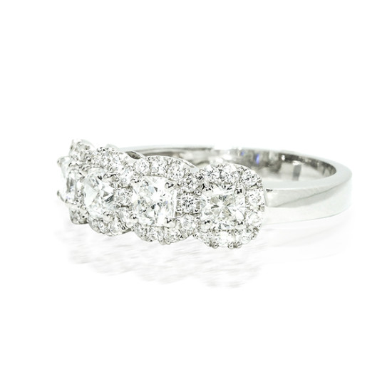 Round brilliant four stone halo diamond ring